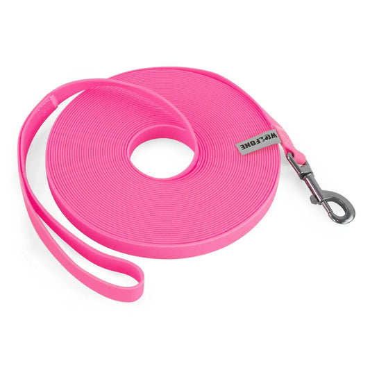 Waterproof PVC long-line training leash coiled on a pale background