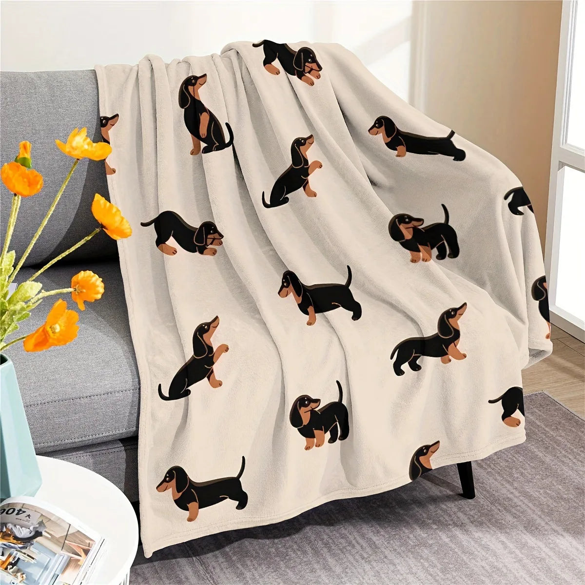 Close-up of the cartoon dachshund print on the flannel blanket