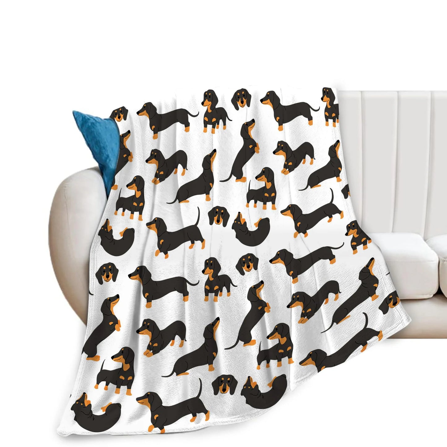 Folded dachshund flannel blanket showing the full print